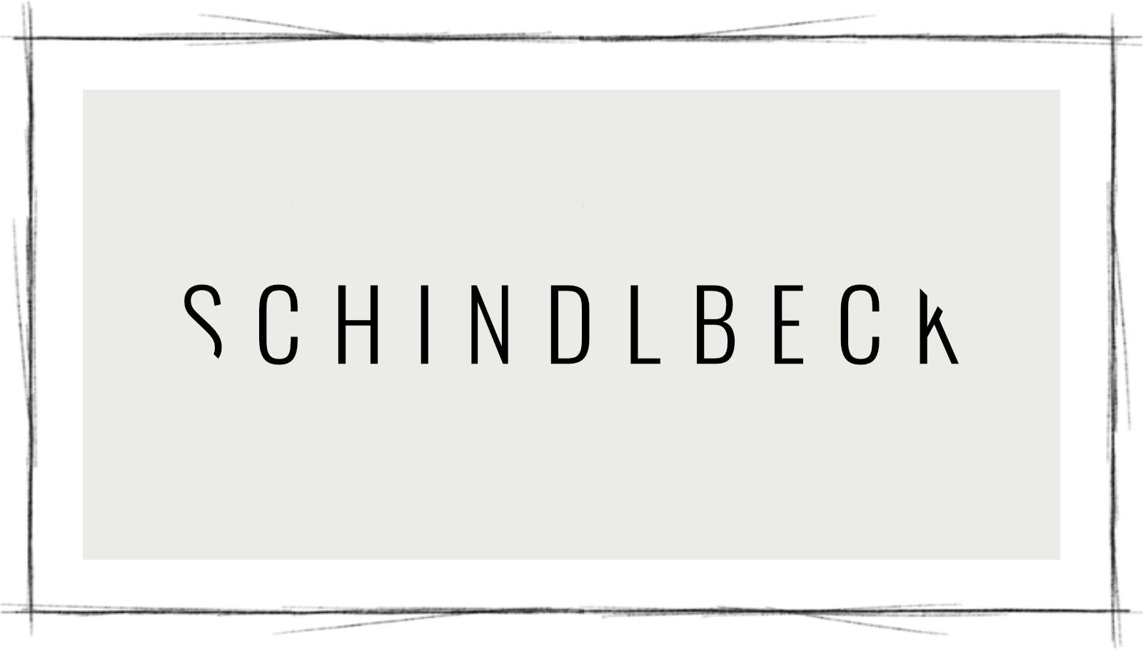 Eine Darstellung des Schindlbeck Logos auf beigem Hintergrund